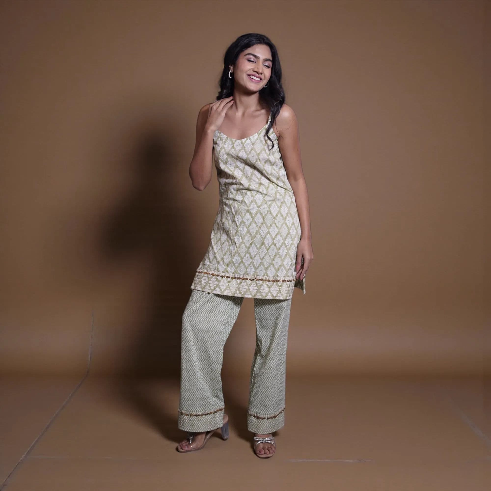 Cream and gold geometric patterned suit with white dupatta