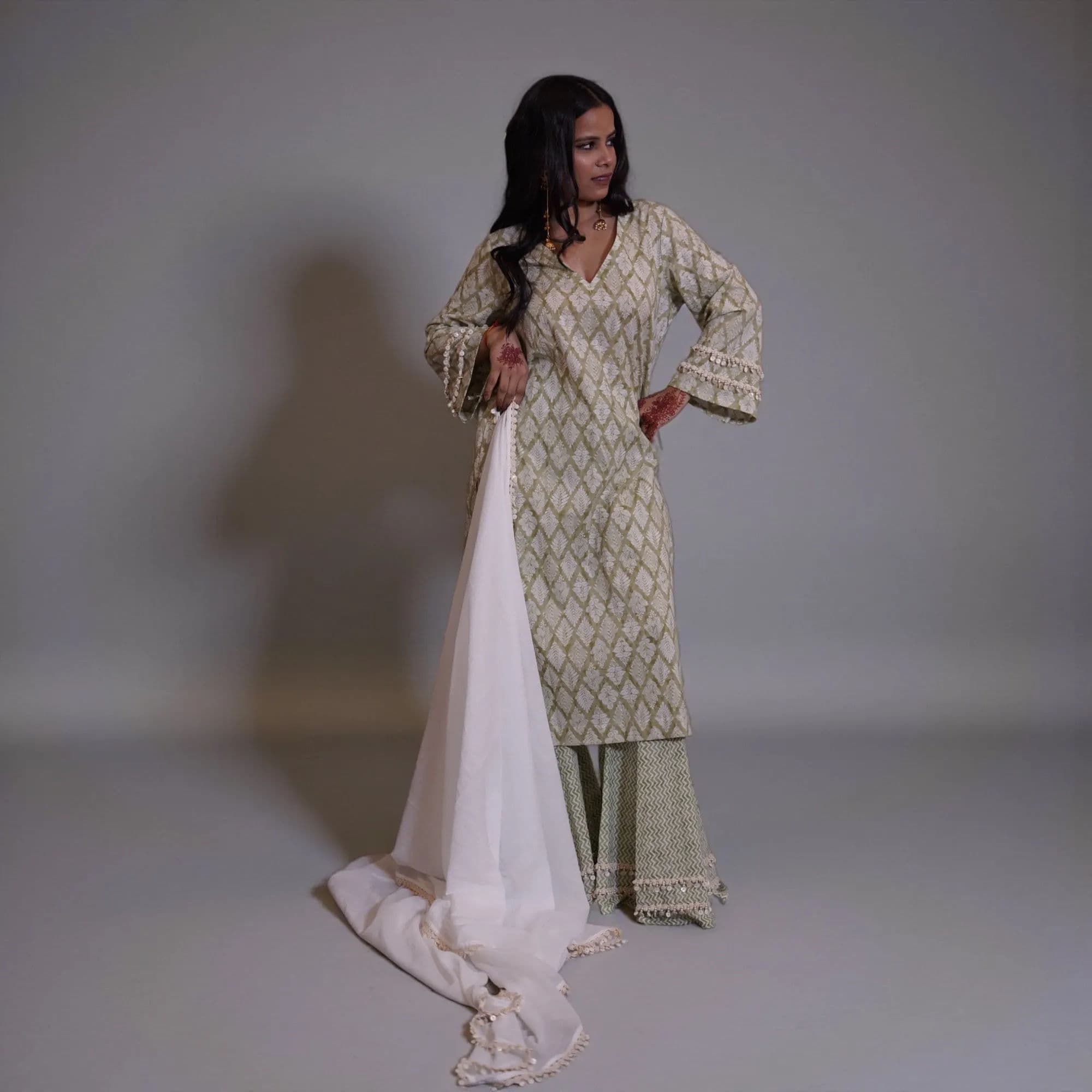 Cream and gold geometric patterned suit with white dupatta 11