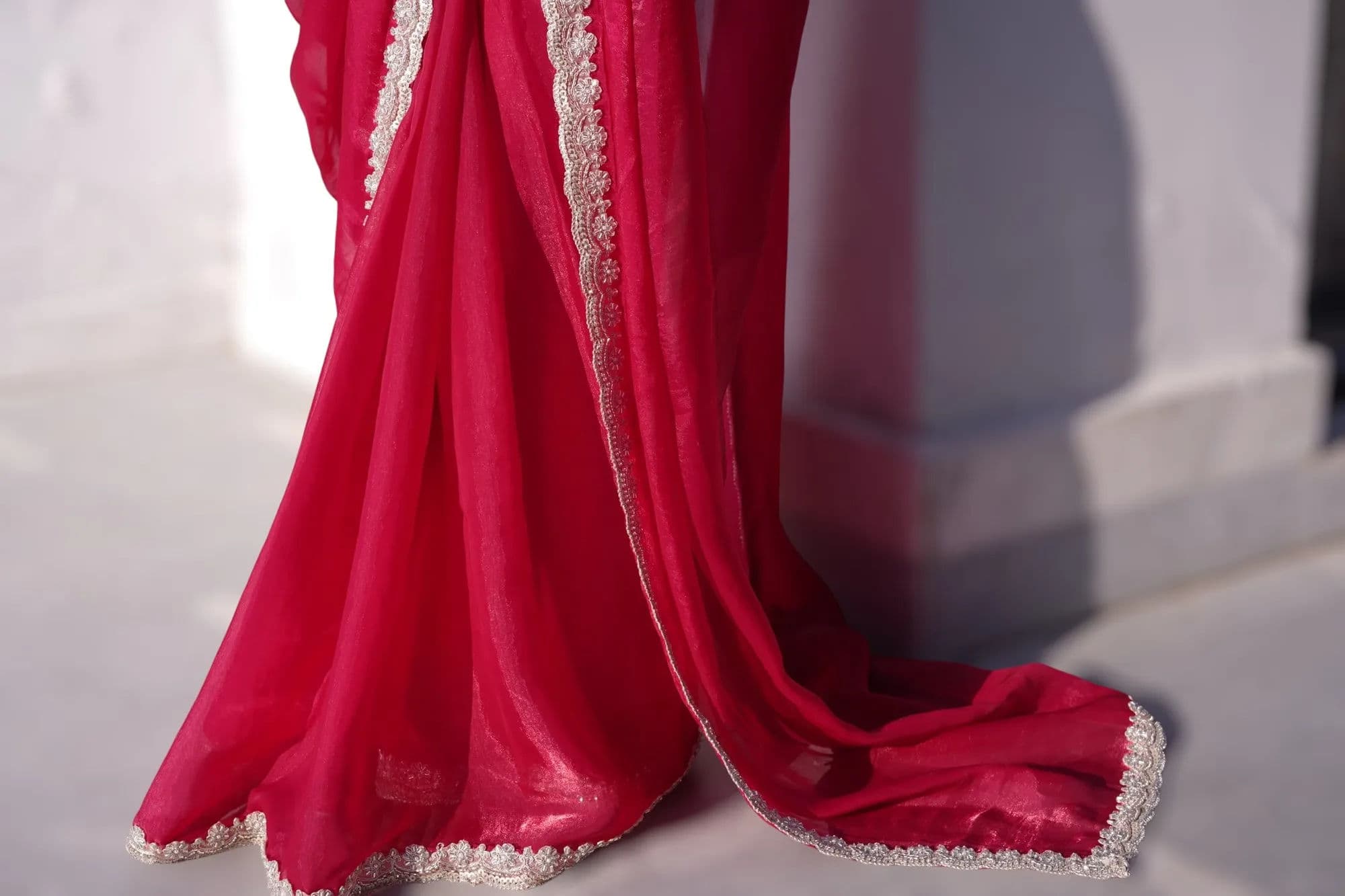 Bright pink saree with white lace border 3