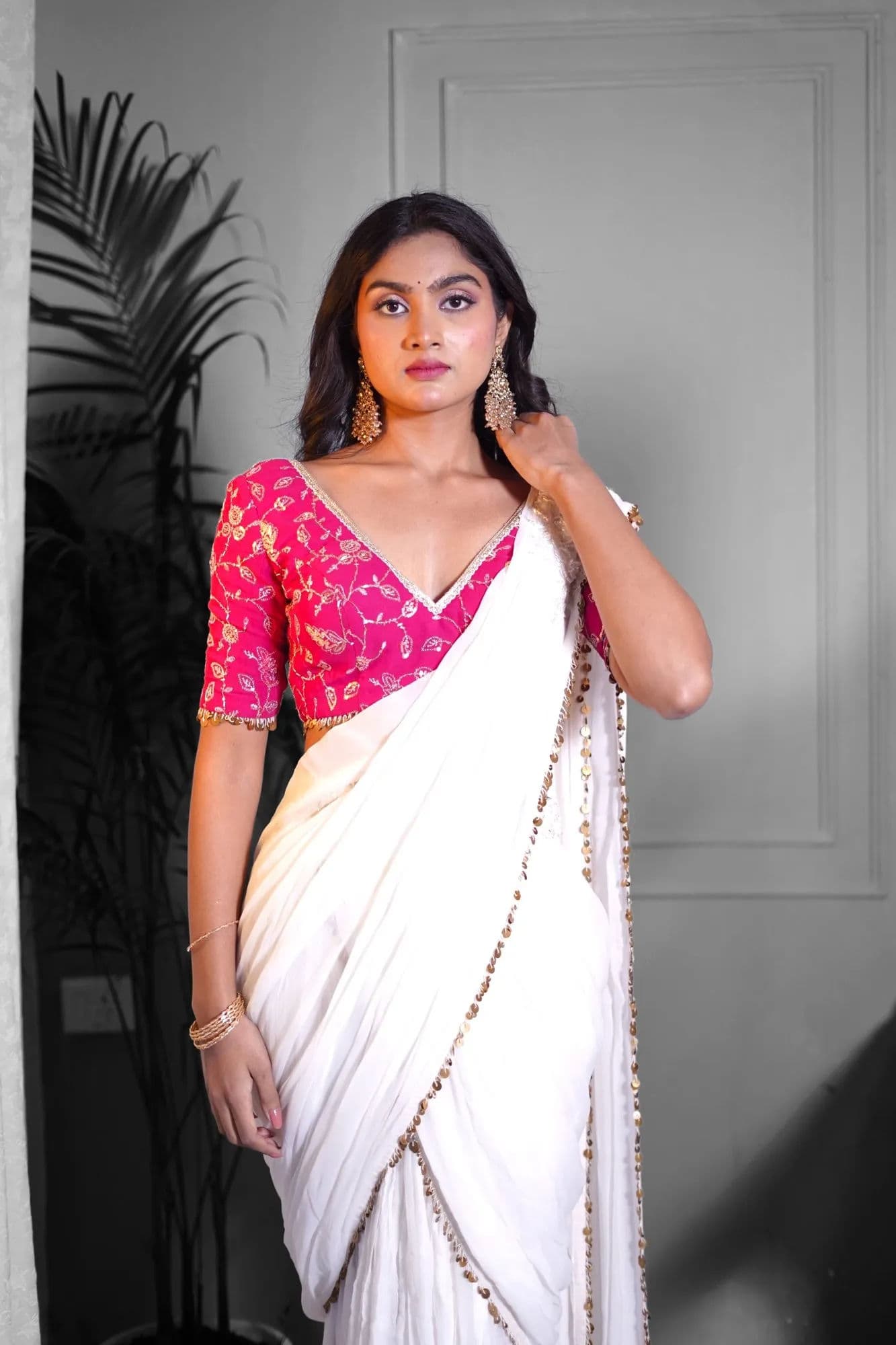 White saree with pink brocade blouse and beaded trim 3