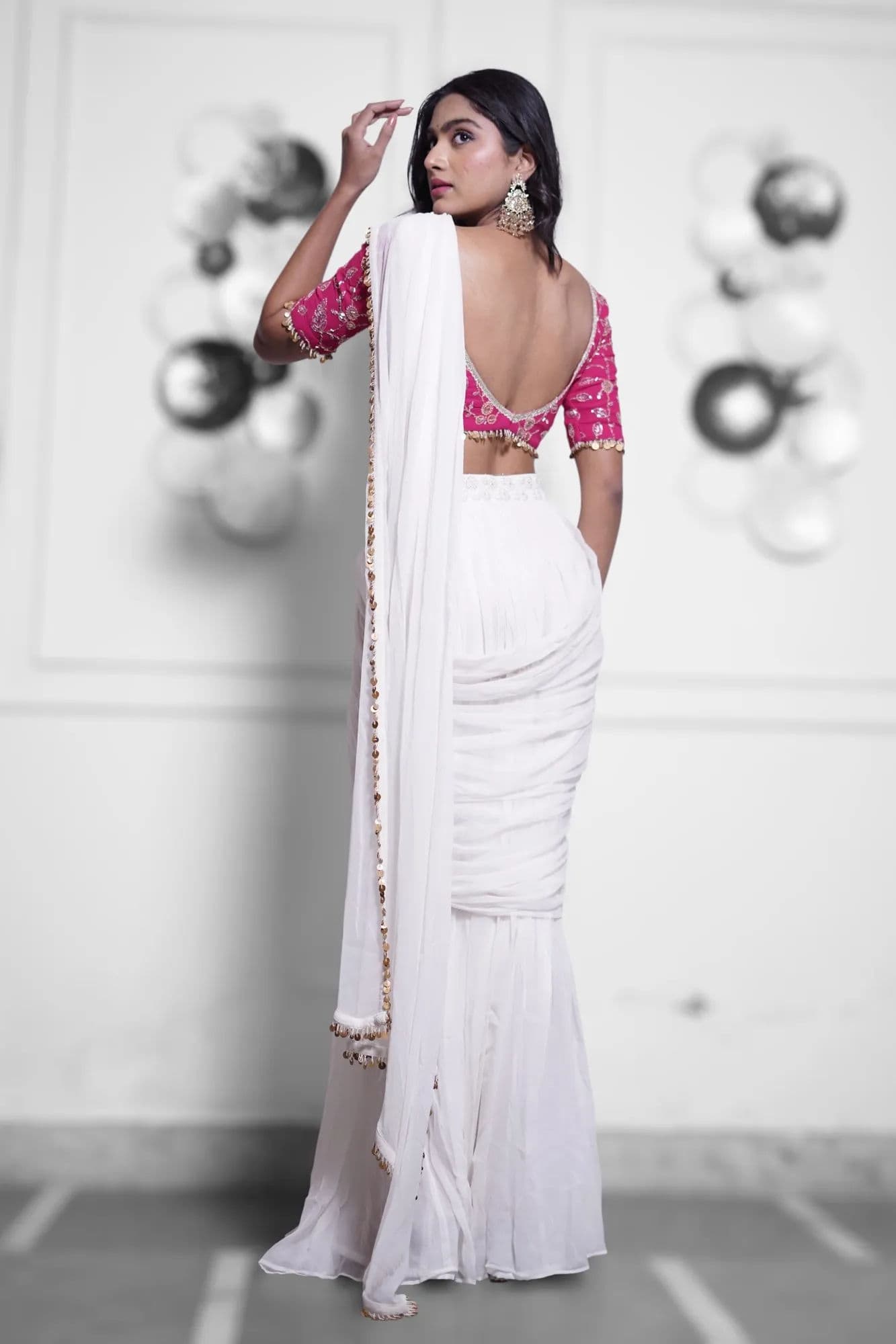 White saree with pink brocade blouse and beaded trim 5