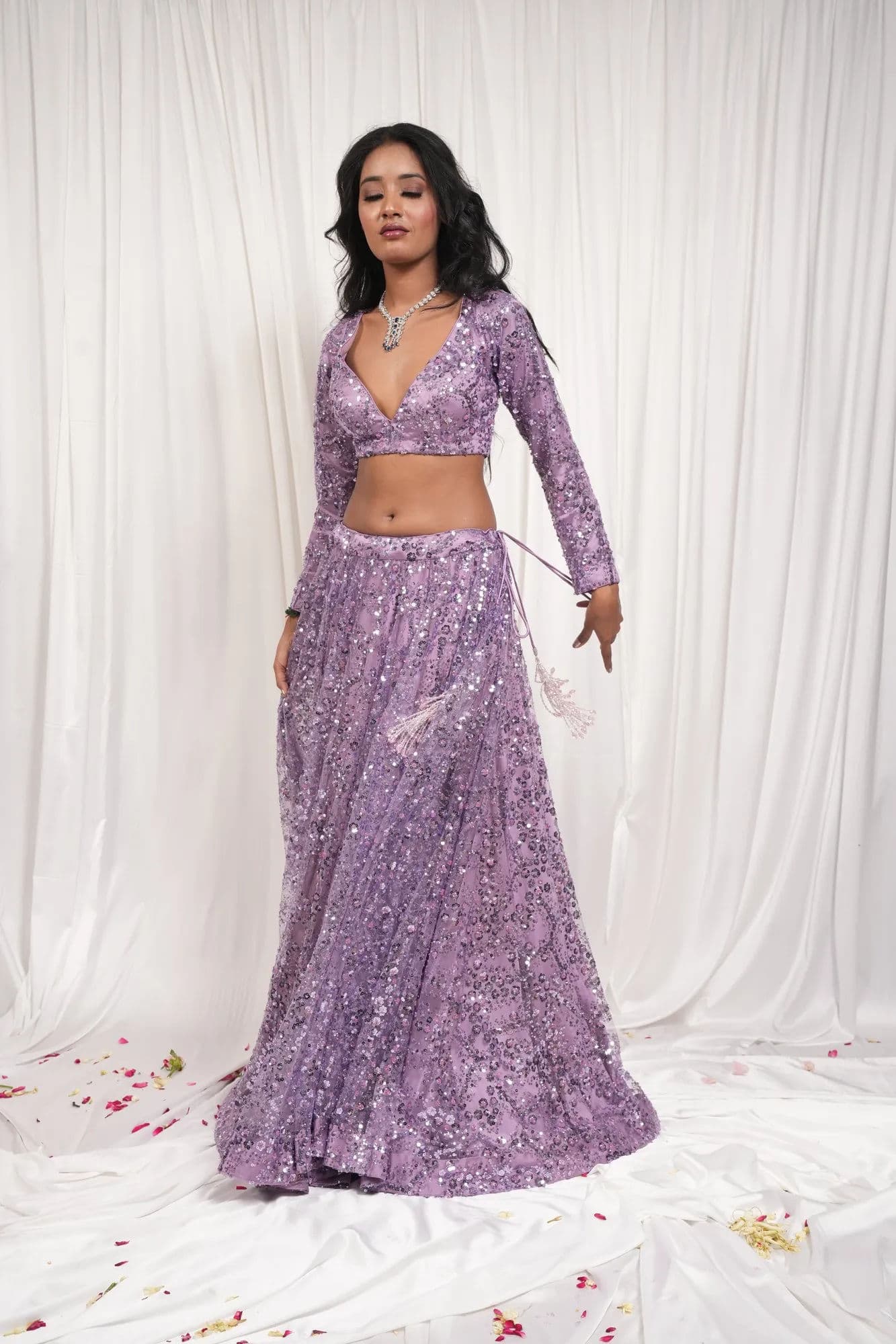 Lavender sequinned lehenga with full-length embellishment