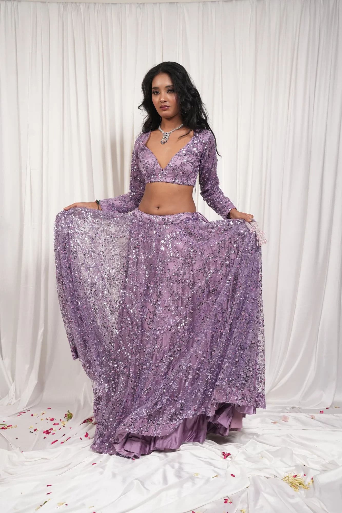 Lavender sequinned lehenga with full-length embellishment