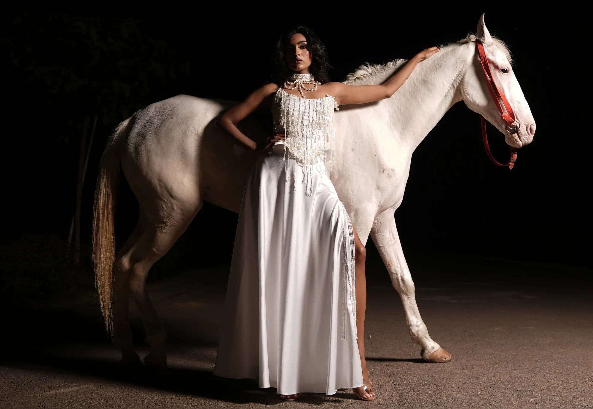 Cream fringed halter-neck evening gown